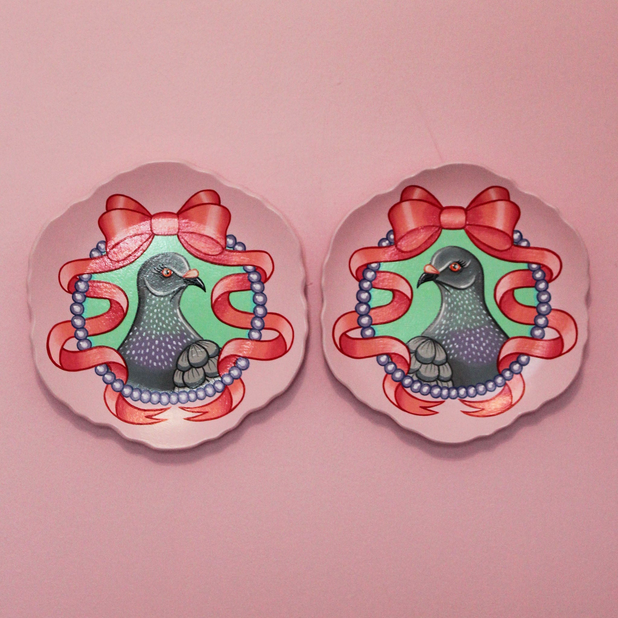 Pair of Hand Painted Pigeon Wall Plates