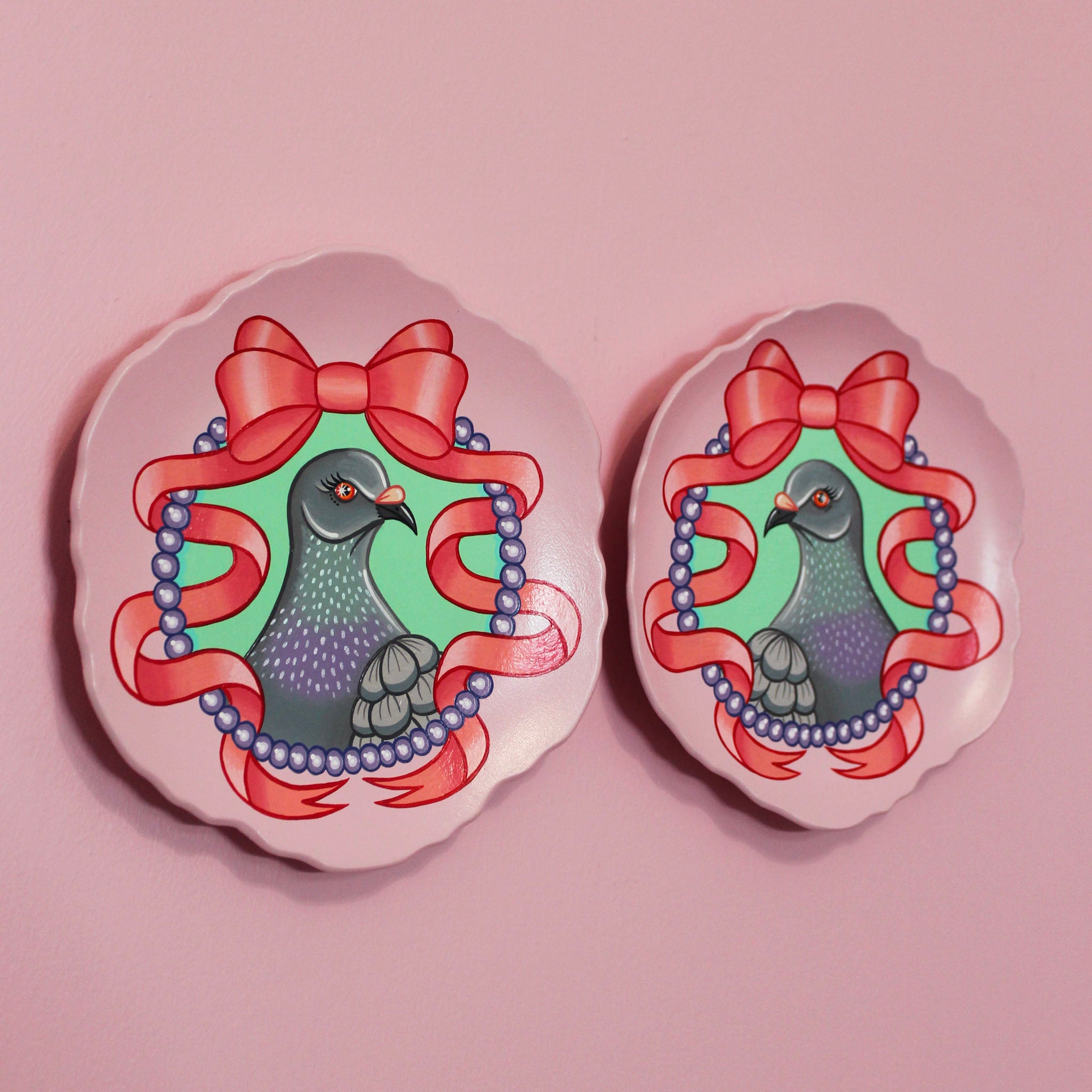 Pair of Hand Painted Pigeon Wall Plates
