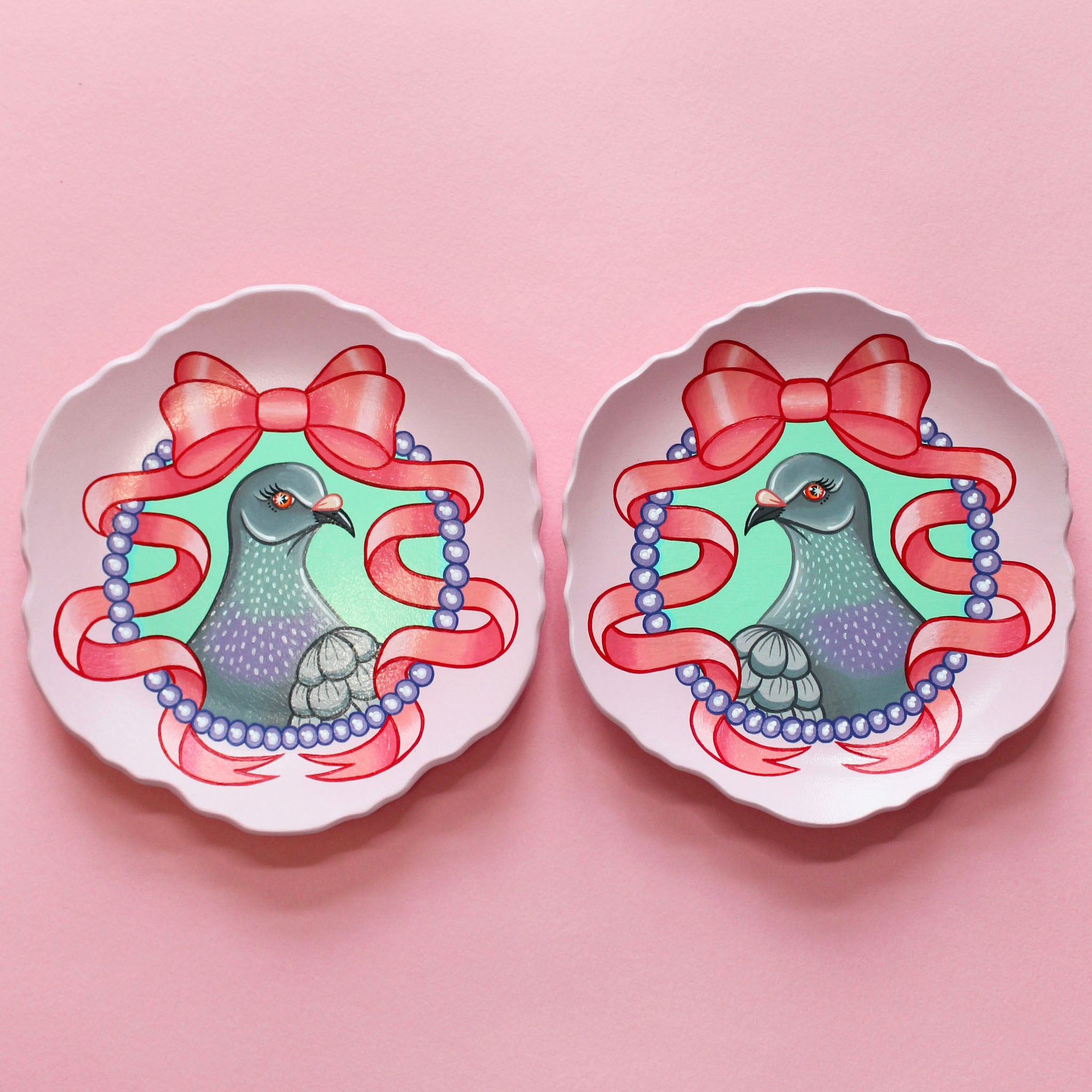Pair of Hand Painted Pigeon Wall Plates